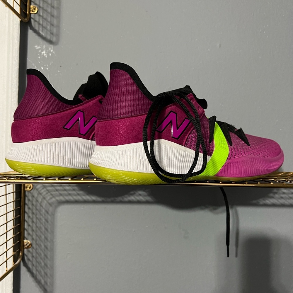 Multi color New Balance basketball sneaker size 10